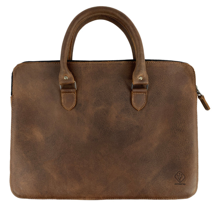 Front view of the LeatherTex 13" Laptop Portfolio Case showcasing its full grain leather design, perfect for MacBook Air/Pro 13 Inch with M1 Chip. This portfolio style case is handmade with care in La Antigua Guatemala and Oaxaca Mexico, emphasizing small batch production, artisan craftsmanship, and fire branding.