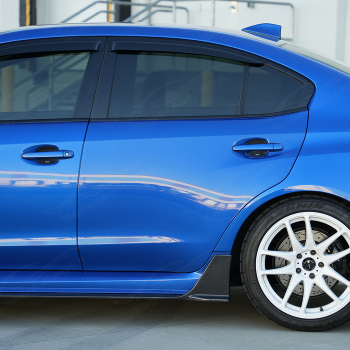 Track-inspired carbon fiber winglet side steps accenting a Crystal White Pearl Subaru VA sedan