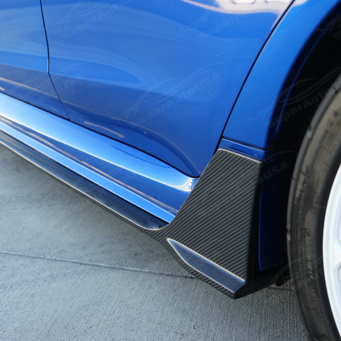 Detailed view of the rear vertical winglet transition on the carbon side extension panel