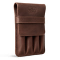 Leather Worx 4-Pen Holder showcased in rich brown full grain leather, offering a stylish and minimalist storage solution for pens or pencils. This classic storage piece exemplifies small batch production with hand cut and sewn artisan craftsmanship, featuring a fire branded logo and handmade quality from La Antigua Guatemala.