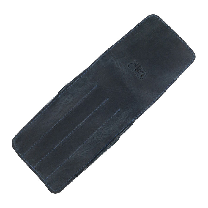 Side angle of the Leather Worx 4-Pen Holder in navy full grain leather, exemplifying its sleek and functional minimalist style. This artisan-crafted pencil case represents small batch production with hand sewn quality and fire branding, all made in La Antigua Guatemala.