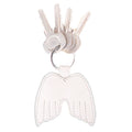 Angel Wings Keychain by Hide & Drink featuring a stylish design with keys attached, crafted from Full Grain Leather. This key ring holder embodies peace and elegance, showcasing small batch production techniques. Handmade in La Antigua Guatemala & Oaxaca Mexico, it is hand-cut, hand-sewn, and fire branded, reflecting true artisan craftsmanship.