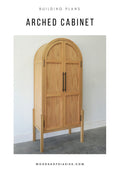Wooden arched cabinet with black handles on a white background, featuring text about building plans from WoodshopDiaries.com.