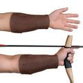 Valhalla Gear Archery Arm Guard shown on a hand gripping a bow, made from durable full grain leather. This forearm protector is perfect for shooting practice, LARPing, and is designed with adjustable straps. A must-have for every archer, showcasing artisan craftsmanship with hand cut and hand sewn details, made in La Antigua Guatemala.