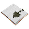 Another view of the Autumn Bookmark (3 pack) by Hide & Drink, demonstrating its charming maple leaf shape and rich texture. Ideal for book lovers, this full grain leather bookmark serves as a perfect gift and practical accessory for those who enjoy reading. Autumn Bookmark (3 Pack), Bookworm Gifts, Cute Accessories, Small Batch Production, Hand Cut, Hand Sewn, Fire Branded.