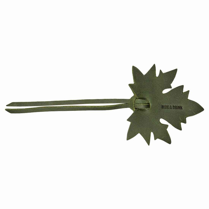 A single Autumn Bookmark (3 pack) by Hide & Drink displayed against a clean background, showcasing its maple leaf design and quality craftsmanship. Perfect for book lovers, this bookmark makes an excellent gift, crafted from soft full grain leather. Autumn Bookmark (3 Pack), Bookworm Gifts, Cute Accessories, Artisan, Handmade in La Antigua Guatemala.