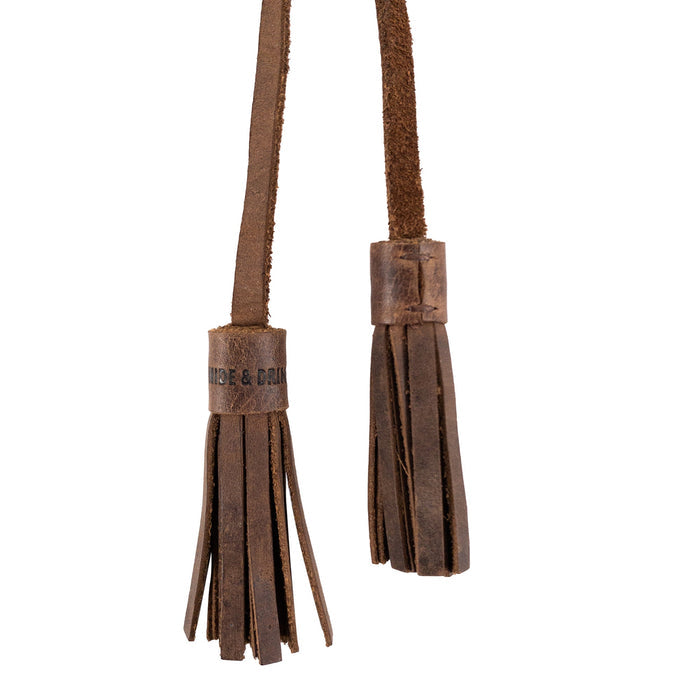 Close-up view of Hide & Drink Bag Accessory / Tassels, featuring luxurious full grain leather and finely stitched details. This tasteful tassel accessory is both functional and stylish. Labrador Ornament (2 Pack) / Hanging Labrador Decoration/Dog Ornament/Hanging Decoration for Purses, Handbags & Backpacks, Full Grain Leather, StockyardX, Small Batch Production, Hand Cut, Hand Sewn, Fire Branded, Artisan, Handmade in La Antigua Guatemala & Oaxaca Mexico.