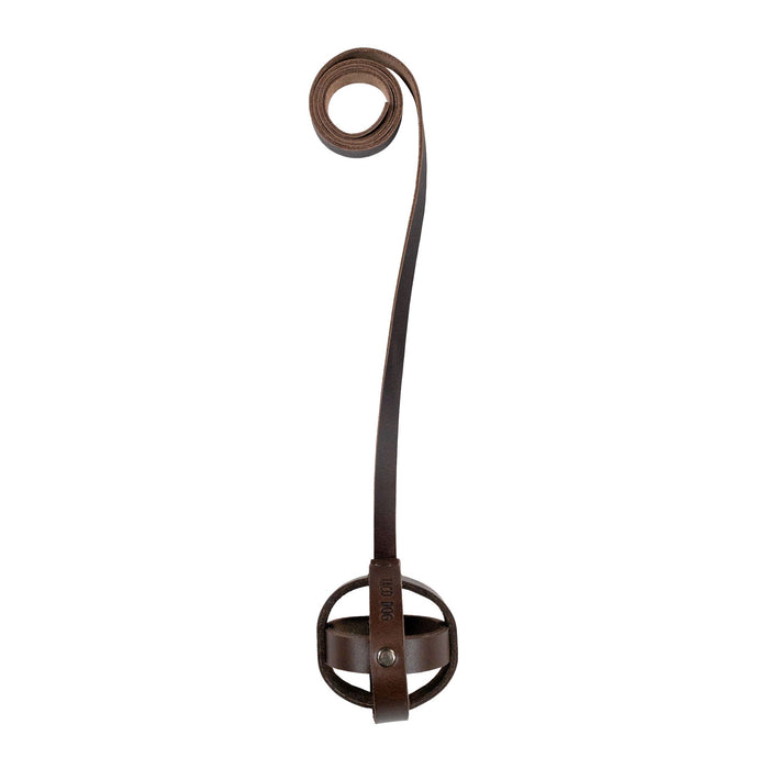 Top view of Taco Dog's Ball Toy with Strap for Cats showcasing its unique design. This handmade chasing pet toy, crafted from full grain leather, is perfect for keeping cats entertained indoors. Artisan-made in La Antigua Guatemala for quality playtime.