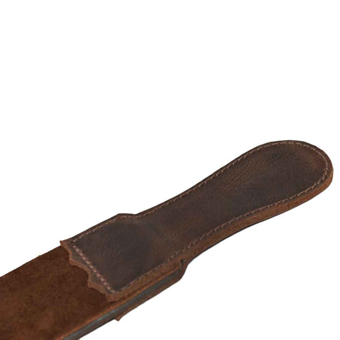 Close-up of the sturdy handle on Hide & Drink's Barber Strop, made from premium Full Grain Leather. This Razor Strop and Shaving Sharpener reflects small batch production and hand sewn details by artisans in La Antigua Guatemala.