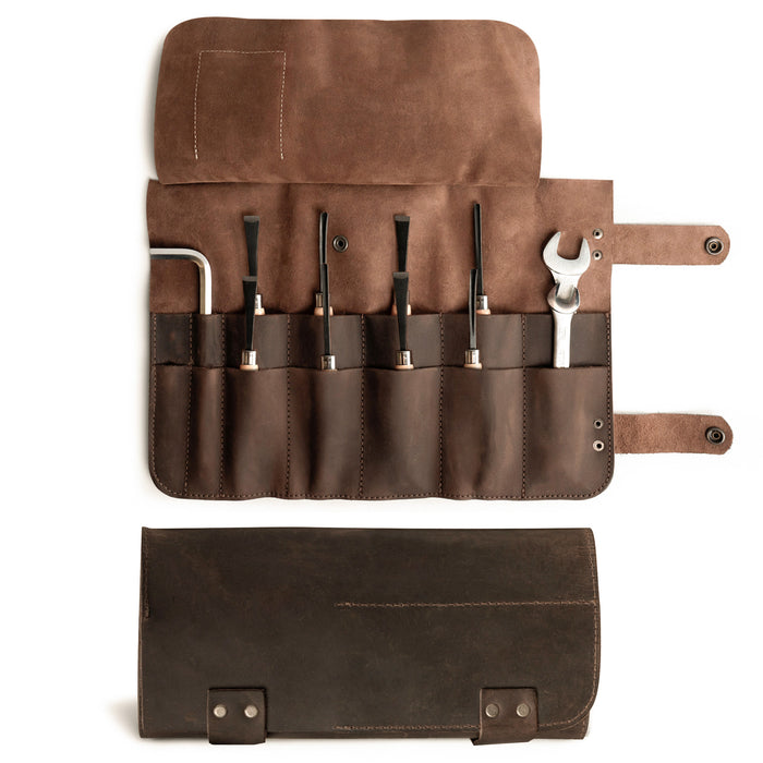 Hide & Drink's Barber Tool Roll, showcasing a Snap Tool Roll Up Bag with 14 Slots, perfect for organizing scissors & screwdrivers. Constructed from Full Grain Leather, this portable carry case embodies StockyardX's commitment to small batch production and artisan craftsmanship, hand cut, hand sewn, and fire branded in La Antigua Guatemala & Oaxaca Mexico.