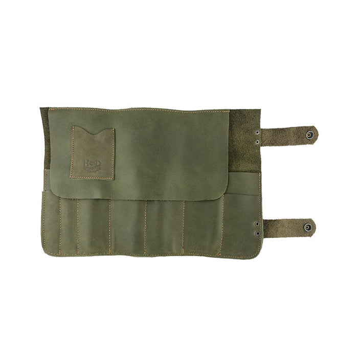 Hide & Drink's Barber Tool Roll showcases a Snap Tool Roll Up Bag with 14 Slots perfect for organization of scissors & screwdrivers. Made from durable Full Grain Leather, this portable carry case reflects StockyardX's commitment to small batch production and artisan craftsmanship, hand cut, hand sewn, and fire branded in La Antigua Guatemala & Oaxaca Mexico.