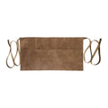 Detail view of the Hide & Drink Barista Leather Waist Apron, highlighting its riveted pockets and sturdy full grain leather used in crafting. Handmade in small batch production in La Antigua Guatemala & Oaxaca Mexico.