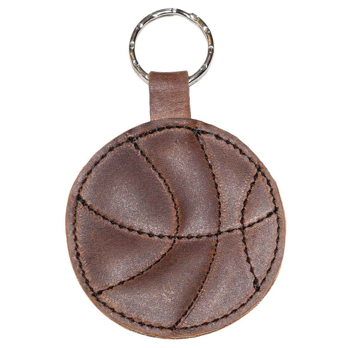 Close-up of the Basketball Keychain by Hide & Drink, highlighting its unique leather stitching and circular basketball shape. A stylish key ring for sports enthusiasts and a thoughtful gift for players, crafted from high-quality full grain leather.