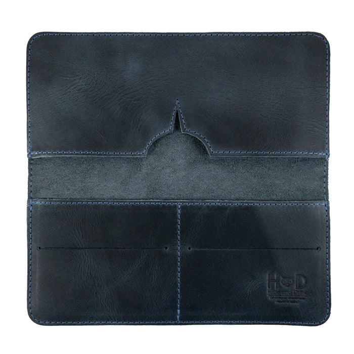 Open bifold wallet for cellphone by Hide & Drink, showing card slots and a pocket for cash. This functional Bifold Wallet for Cellphone is crafted from Full Grain Leather, combining elegance with utility. Handcrafted in small batches by skilled artisans in La Antigua Guatemala & Oaxaca Mexico.