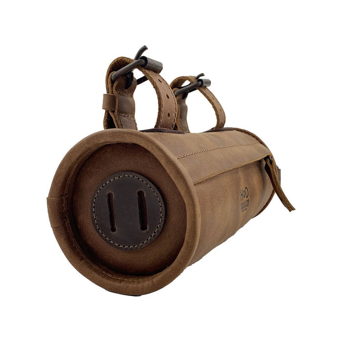 Hide & Drink Bike Bag showcasing the quality of full grain leather, perfect as an artisan cylinder tube pouch for bicycles. This bicycle accessory highlights hand cut and hand sewn craftsmanship, all made in La Antigua Guatemala & Oaxaca Mexico.