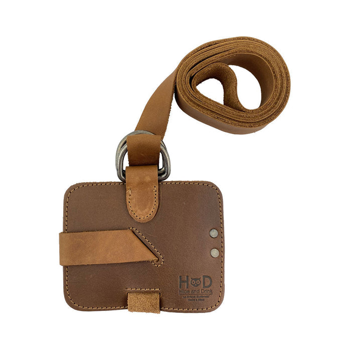 An overhead shot of the Hide & Drink Book Strap Carrier, displaying its practical features and adjustable strap. Artisan-crafted from Full Grain Leather in La Antigua Guatemala, it‚Äôs a great choice for stylish book lovers.