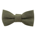 Green suede bow tie for dog collar by Taco Dog, showcasing a soft texture. This stylish Bow Tie for Dog Collar can easily attach to collars (1.25 in. wide) for a trendy touch. Bow Tie for Dogs - Attaches onto Most Dog Collars (Collar Not Included) - Fancy Cute Stylish Pet Accessory Attachment, Full Grain Leather, StockyardX, Small Batch Production, Hand Cut, Hand Sewn, Fire Branded, Artisan, Handmade in La Antigua Guatemala & Oaxaca Mexico.