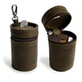 Stylish Bucket Coin Release by Hide & Drink, showcasing a full grain leather piggy bank bucket style with a zipper and attached clip, ideal as a money box or cash organizer. This artisan handmade coin case is crafted in La Antigua Guatemala & Oaxaca Mexico.