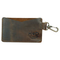 Stylish Card Organizer with Lobster from Hide & Drink, showcasing a Leather Card & Key Holder that holds up to 4 cards, ideal as a Keychain Organizer. Made from durable Full Grain Leather, it's a perfect accessory for minimalists. Crafted with care in small batch production, this artisan piece is hand cut and hand sewn, fire branded for authenticity, and proudly made in La Antigua Guatemala & Oaxaca Mexico.