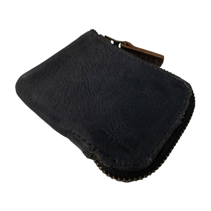 Open interior view of a black Hide & Drink Card Pocket Wallet displaying its organized compartments. This zippered card wallet for men and women works as a coin pouch and money holder, crafted with care from full grain leather by artisans in La Antigua Guatemala.
