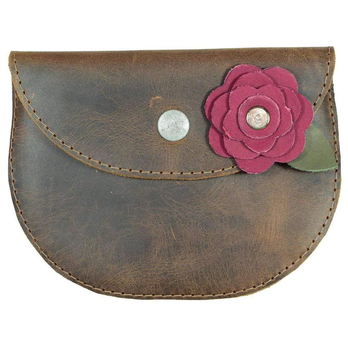 Close-up of the Card Wallet Rose Design by Hide & Drink showcasing its stylish rose embellishment on a brown, full grain leather wallet. Perfect as a phone holder, cash organizer, or cable pouch. A handmade accessory, meticulously crafted in La Antigua Guatemala, making every piece unique with small batch production.