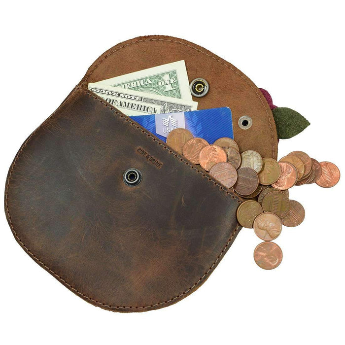 Interior view of the Card Wallet Rose Design by Hide & Drink displaying cash, coins, and a card, emphasizing its versatility as a wallet case and organizer. Made from durable full grain leather, this artisan piece is designed in La Antigua Guatemala & Oaxaca Mexico, ensuring quality with each hand sewn detail.