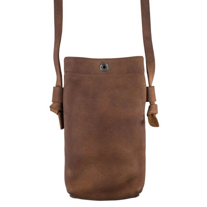 Back view of the Hide & Drink Cell Phone Shoulder Bag highlighting the full grain leather craftsmanship. This small batch production phone case is perfect for daily use and makes for an ideal shoulder or crossbody bag, showcasing the artisan's touch and handmade quality from La Antigua Guatemala & Oaxaca Mexico.