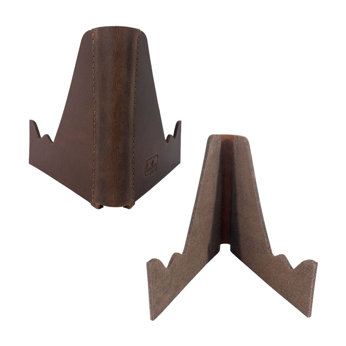 The Leather Worx Cell Phone Stand for Desk presented upright, revealing its smart foldable design that supports a smartphone. This rustic Cell Phone Holder is an essential office accessory crafted from full grain leather, representing small batch production and highlighting artisan skills in La Antigua Guatemala & Oaxaca Mexico, with its hand cut and fire branded features.