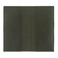 The Checkbook Leather Cover by Hide & Drink featuring a chic design, serving as a minimalist organizer for standard checkbooks. Crafted from full grain leather, this handmade item reflects artisanal techniques in La Antigua Guatemala and Oaxaca Mexico, showcasing small batch production.