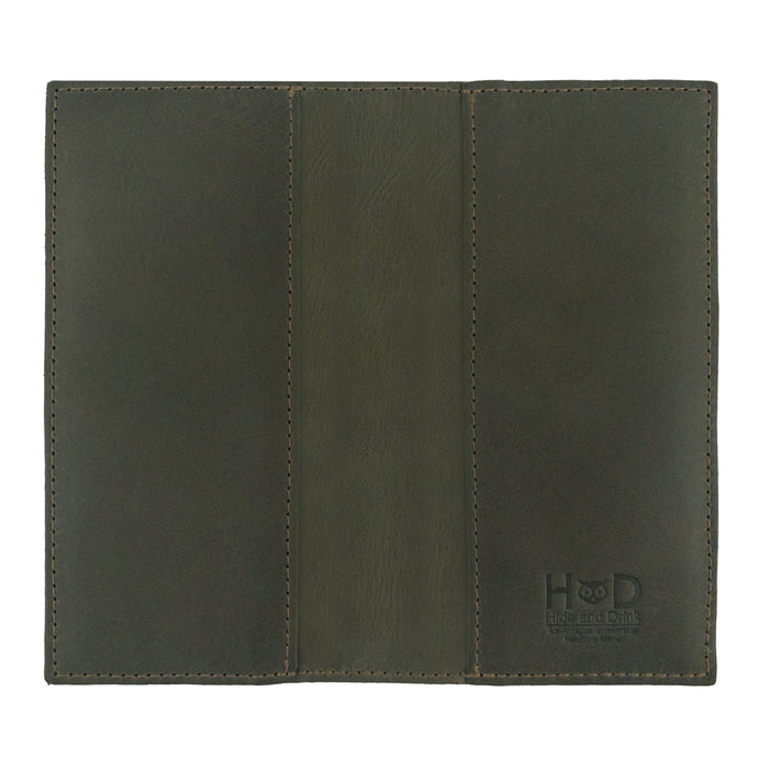 The Checkbook Leather Cover by Hide & Drink featuring a chic design, serving as a minimalist organizer for standard checkbooks. Crafted from full grain leather, this handmade item reflects artisanal techniques in La Antigua Guatemala and Oaxaca Mexico, showcasing small batch production.