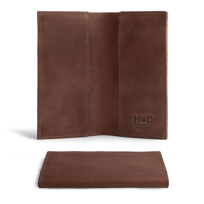 Inside view of the Checkbook Leather Cover by Hide & Drink, designed as a minimalist organizer for standard checkbooks, made from full grain leather. This handmade piece represents artisan craftsmanship from La Antigua Guatemala & Oaxaca Mexico, emphasizing small batch production.