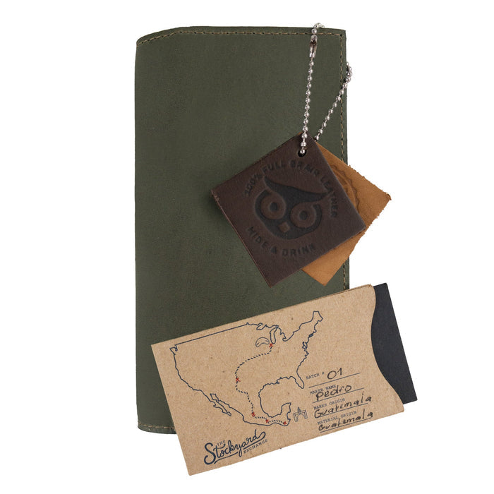 Checkbook Leather Cover by Hide & Drink in a sophisticated style, functioning as a minimalist organizer for standard checkbooks. This artisan-crafted piece is made from full grain leather, showcasing small batch production from La Antigua Guatemala and Oaxaca Mexico.