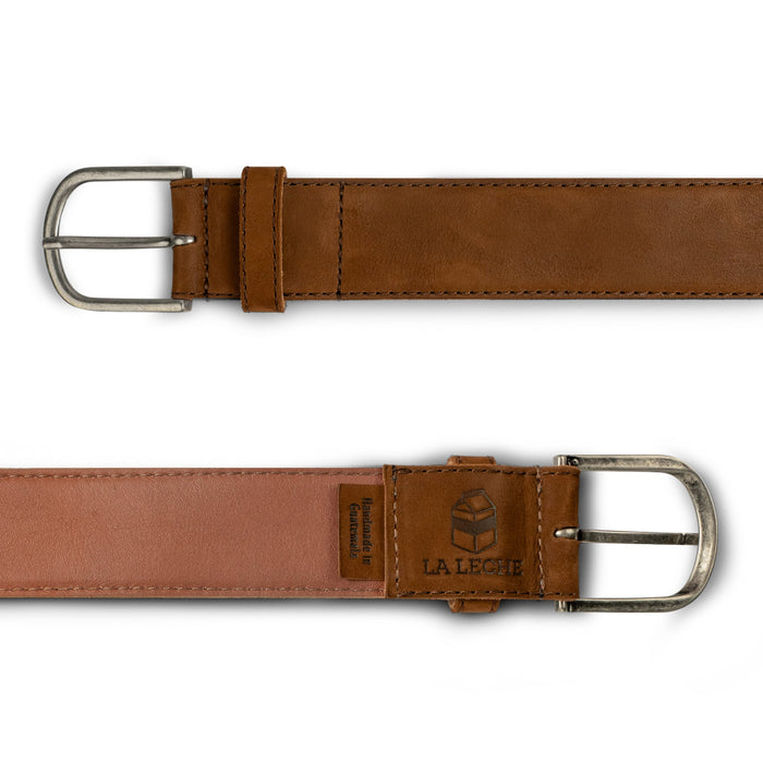 La Leche Classic Leather Belt with Glove Liner, highlighting the full grain leather and showcasing the premium hand cut and hand sewn details. This men's waist belt is a testament to artisan craftsmanship, made in small batches in La Antigua Guatemala & Oaxaca Mexico.