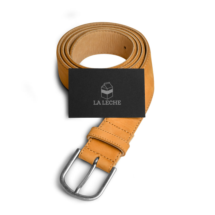 Classic Leather Belt with Glove Liner by La Leche, beautifully packaged, showcasing the premium quality full grain leather. This men's waist belt is a perfect addition to any outfit and reflects the artisan techniques from La Antigua Guatemala & Oaxaca Mexico. It's tagged as Classic Cowboy Mens Adjustable Belt StockyardX, Small Batch Production, Hand Cut, Hand Sewn, and Fire Branded.