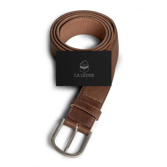 Classic Leather Belt with Glove Liner presented by La Leche with a brand card, highlighting a full grain leather belt for men designed for versatile styles. This handmade men's waist belt for jeans combines artisan elements including small batch production, hand cutting, sewing, and fire branding from La Antigua Guatemala & Oaxaca Mexico.