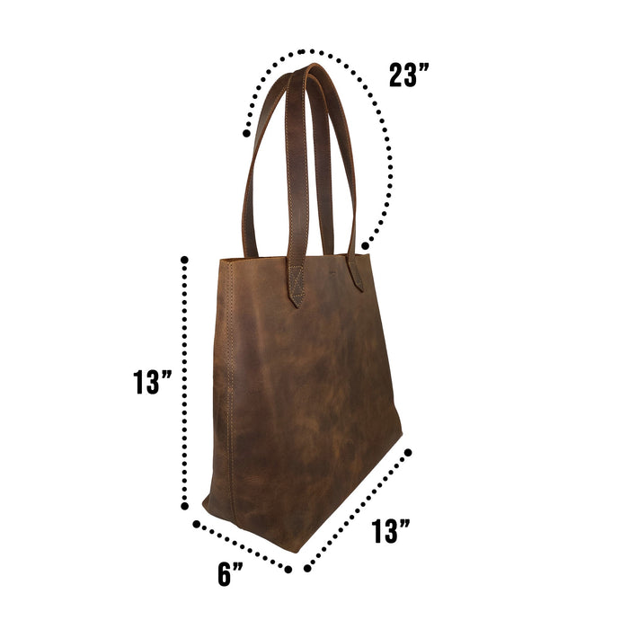 Heather's Classic Tote Bag with dimensions highlighted, illustrating its design as a spacious handbag made from high-quality full grain leather. This artisan-crafted piece is perfect for travel and shopping experiences.