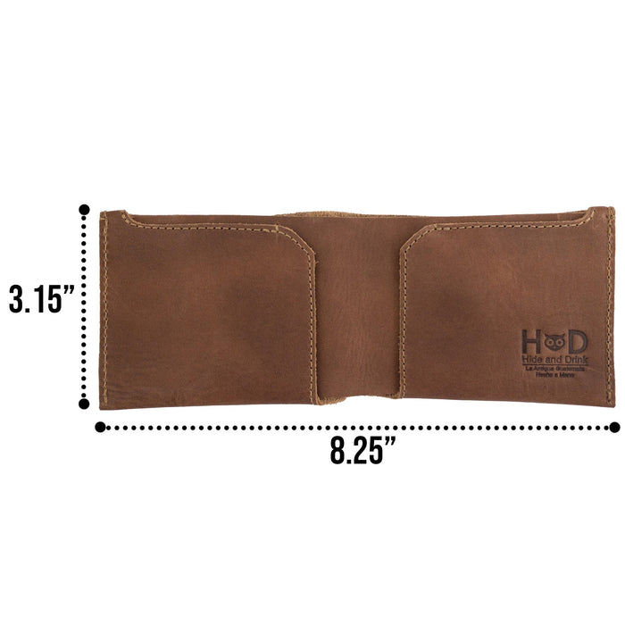 Side view of the brown Hide & Drink Classic Wallet highlighting its compact design and full grain leather finish. Classic Wallet, Card Organizer, Money Holder, Vintage Pocket, Travel Accessories, Full Grain Leather, StockyardX, Small Batch Production, Hand Cut, Hand Sewn, Fire Branded, Artisan, Handmade in La Antigua Guatemala & Oaxaca Mexico.