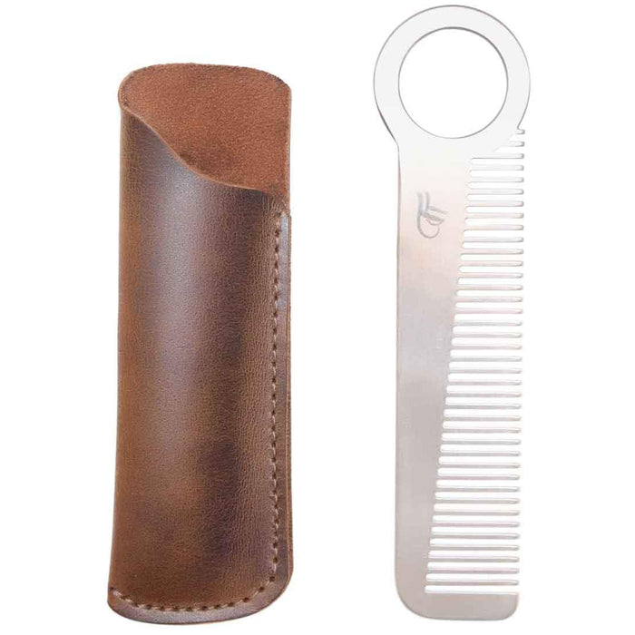 Hide & Drink Comb Case with a combination of a leather holster and comb, showcasing its utility for personal care. A stylish protector sleeve made of full grain leather, reflecting small batch production and skilled craftsmanship. Handmade in La Antigua Guatemala & Oaxaca Mexico.
