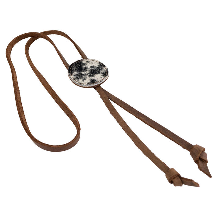 Charming Cowboy Bolo Tie from Western Leather Works, featuring a round shape design and full grain leather material. An artisan necktie that reflects small batch production and the dedication to handcrafted quality, made in La Antigua Guatemala & Oaxaca Mexico.