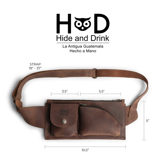 Detailed dimensions of the Crossbody Multi-Pocket Bag by Hide & Drink highlight its compact yet spacious design. Crafted from premium full grain leather, this versatile Crossbody Bag is perfect as a Messenger Bag or Shoulder Bag and acts as a fantastic Travel Accessory. The craftsmanship remains true to artisan standards in small batch production from La Antigua Guatemala & Oaxaca Mexico.