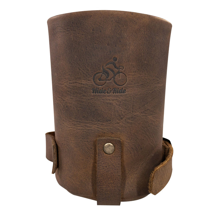 Close-up of the Cruzy Bike Handlebar Cup Holder by Hide & Ride, emphasizing its handmade full grain leather construction. This artisan piece serves as a great insulated beverage pouch for minimalists and urban nomads, created in La Antigua Guatemala.