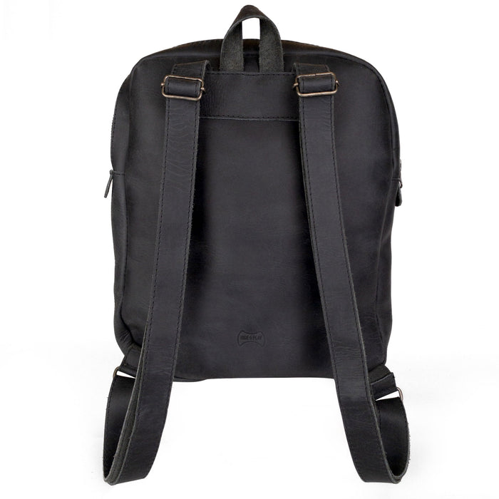 The back view of the Hide & Play Daily Backpack with Unicorn Design, highlighting its sturdy straps and durable full grain leather construction. This casual bag doubles as a messenger bag and travel bag for men and women, designed for everyday wear. Each piece is handcrafted in La Antigua Guatemala, reflecting a commitment to artisan craftsmanship in small batch production.