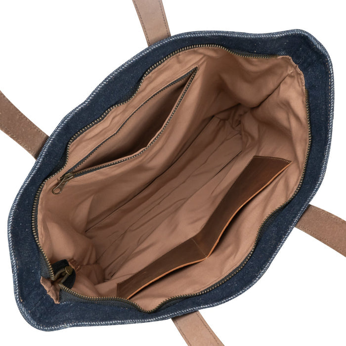 Interior view of the Denim Tote Bag with Leather Straps by Hide & Drink showcasing its spacious layout with compartments. Durable Denim Tote Bag with Leather Straps, Cell Phone Purse, Shoulder Bag for Girls, Full Grain Leather, StockyardX, Small Batch Production, Hand Cut, Hand Sewn, Fire Branded, Artisan, Handmade in La Antigua Guatemala & Oaxaca Mexico.