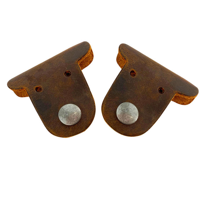 Two adorable Dog Cord Keepers by Taco Dog, perfect for wrapping up your headphones and chargers in style. Made of full grain leather, these handmade accessories feature clip snaps for easy management and travel. Get organized with this 2 pack of Dog Cord Keepers, featuring artisan craftsmanship from La Antigua Guatemala.