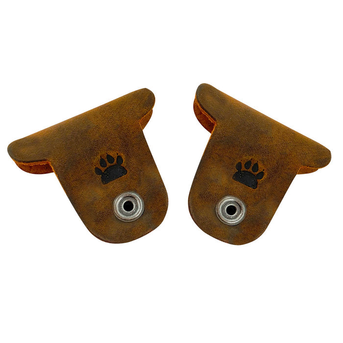 Keep your cords neat and tidy with Taco Dog's Dog Cord Keepers, made from premium full grain leather. These unique 2 pack accessories feature clips for easy management of headphones and chargers, perfect for travel. Experience the artisan quality of handmade pieces from La Antigua Guatemala.
