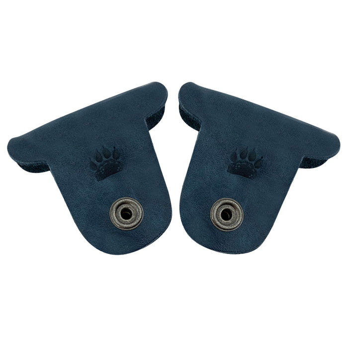 Taco Dog's navy blue Dog Cord Keepers are ideal for keeping your cords tidy and organized. Designed from full grain leather, these handmade accessories feature clips for easy organization of headphones and chargers during travel. Enjoy artisanal quality from La Antigua Guatemala with this unique 2 pack.