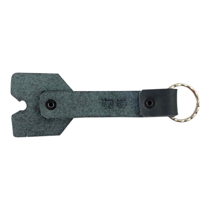 Back view of the black Taco Dog Doggy Fob Keychain, emphasizing its unique construction. Crafted from full grain leather, this lightweight and functional keychain is perfect for dog enthusiasts, providing a great gift option that showcases artisan craftsmanship from La Antigua Guatemala.
