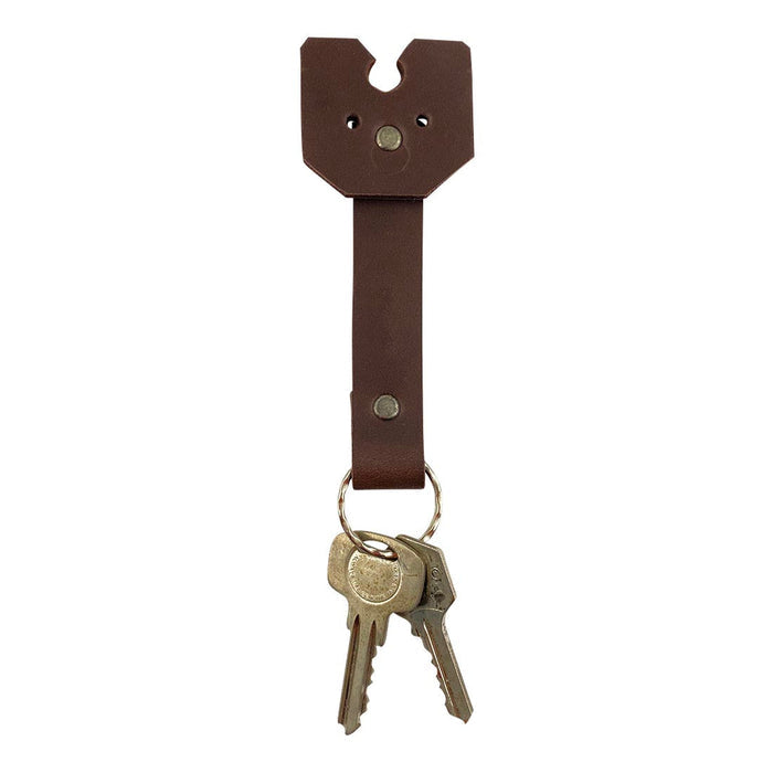 Taco Dog Doggy Fob Keychain displayed with keys attached, highlighting its practicality. This functional accessory, crafted from full grain leather, combines style and durability, making it an excellent gift for dog lovers and supporting artisan craftsmanship in La Antigua Guatemala.