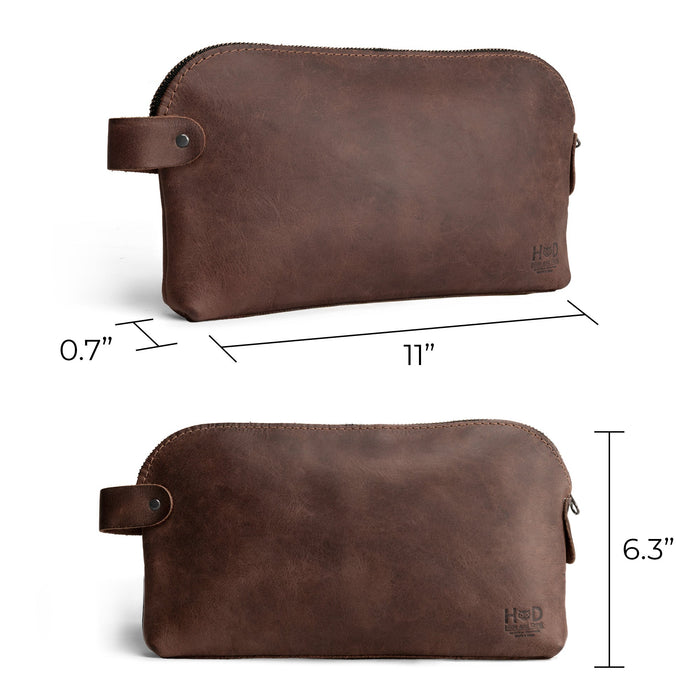 Dopp Kit Utility Bag by Hide & Drink featuring a beautiful leather finish. This artisan-crafted Dopp Kit Utility Bag serves as an all-purpose travel bag, made from premium full grain leather with hand cut and hand sewn details, handmade in La Antigua Guatemala & Oaxaca Mexico.