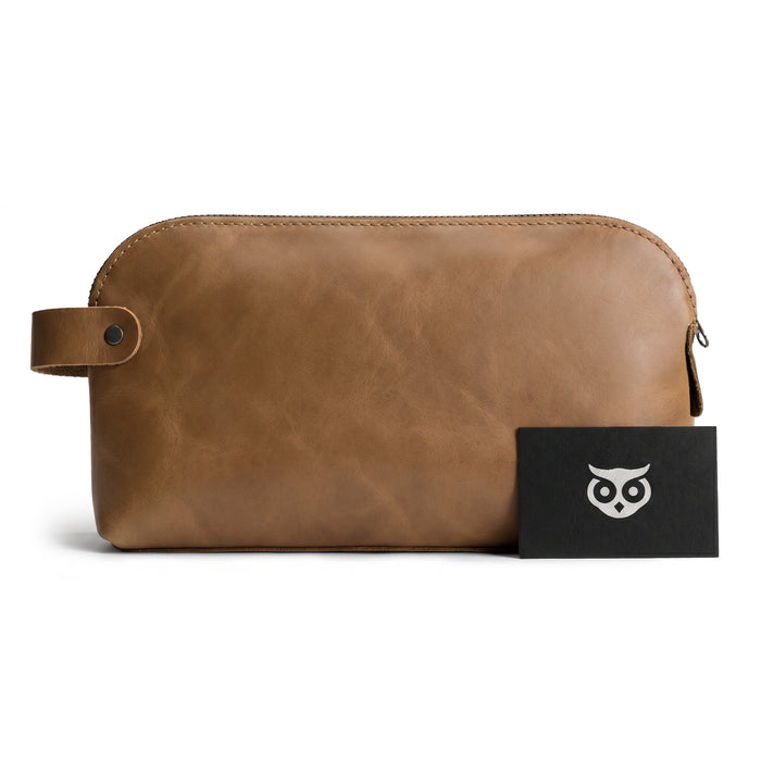 Dopp Kit Utility Bag by Hide & Drink presenting a practical design that fits everyday needs. This artisan Dopp Kit Utility Bag is made from full grain leather, highlighting hand cut and hand sewn techniques, crafted as part of small batch production in La Antigua Guatemala & Oaxaca Mexico.